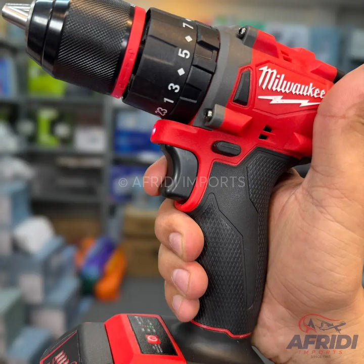 Red and black cordless drill with an adjustable chuck and speed settings.