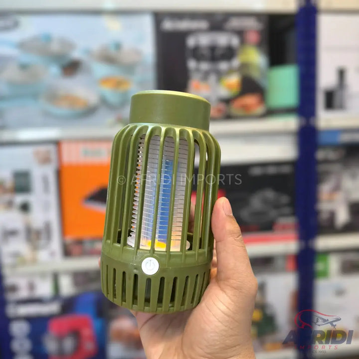 Olive green portable electric mosquito zapper with a blue UV light.