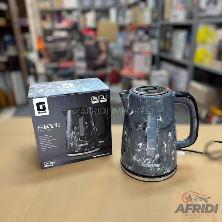 A black and grey marbled electric kettle with a 1.7-liter capacity.