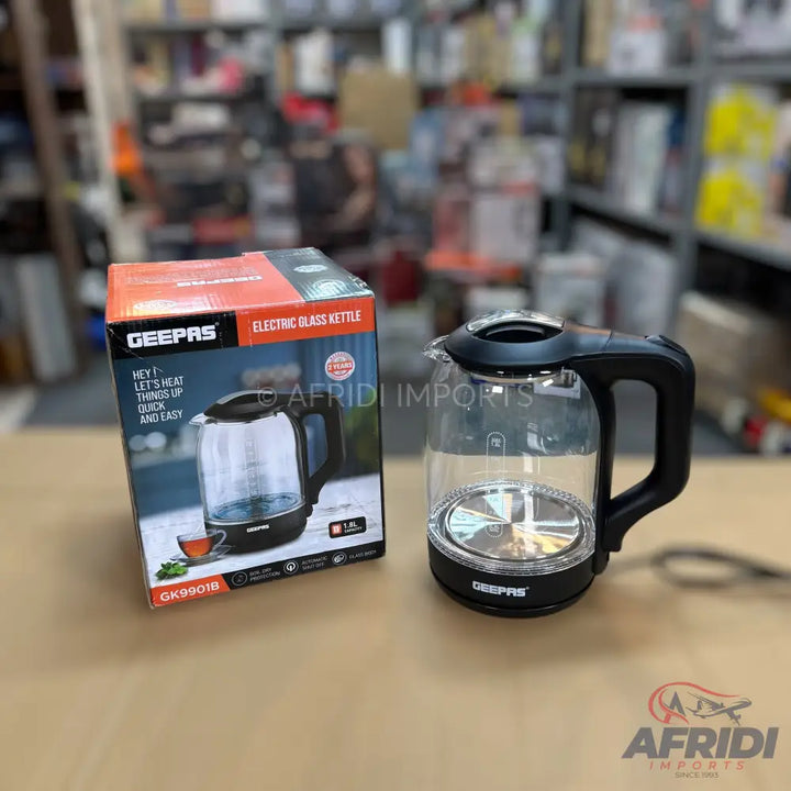 A Geepas electric glass kettle with a black handle and base.
