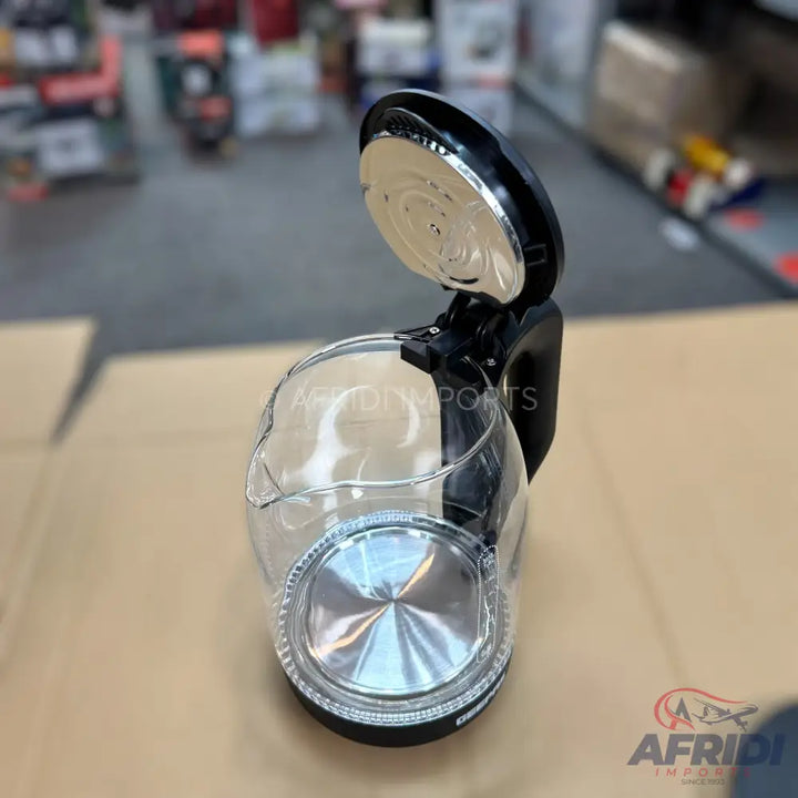 Clear glass electric kettle with an open lid and black accents.