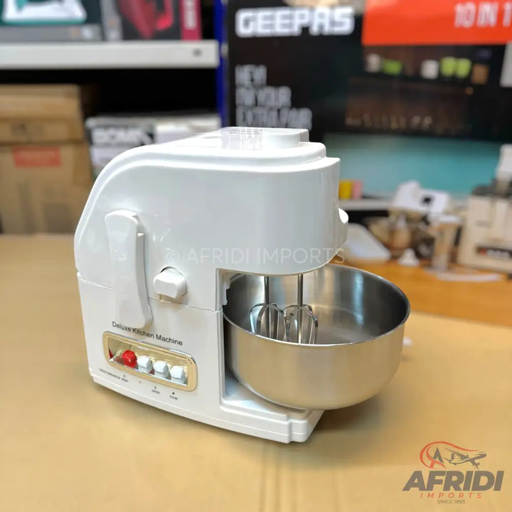 White stand mixer with a stainless steel bowl and beaters.