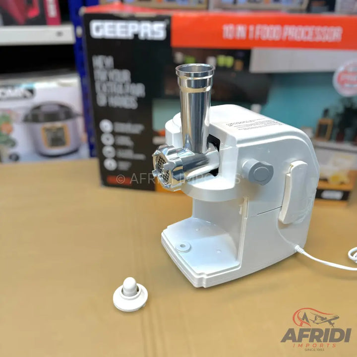 White electric meat grinder with a metal feeding tube.