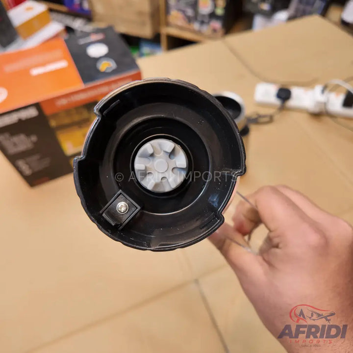 The base of a blender or food processor, showing the drive coupling.
