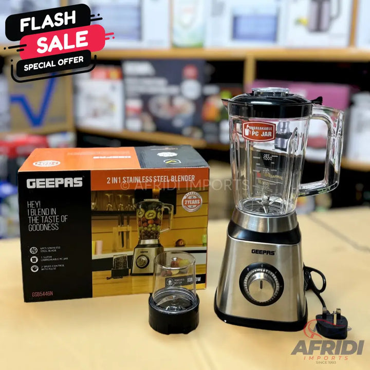 A Geepas 2-in-1 stainless steel blender with a clear jar and an additional small grinding cup.