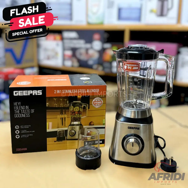 A Geepas 2-in-1 stainless steel blender with a clear jar and an additional small grinding cup.