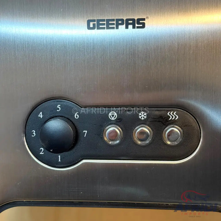 Stainless steel toaster with browning control and function buttons.