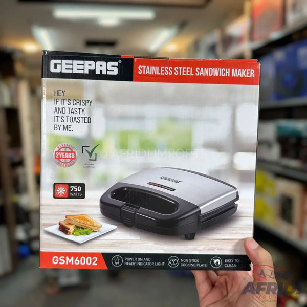 A stainless steel sandwich maker with 750 watts of power, a 2-year warranty, a non-stick cooking plate, and easy-to-clean features.