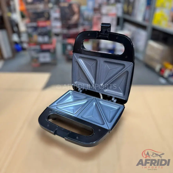 Black electric sandwich maker with non-stick triangular plates