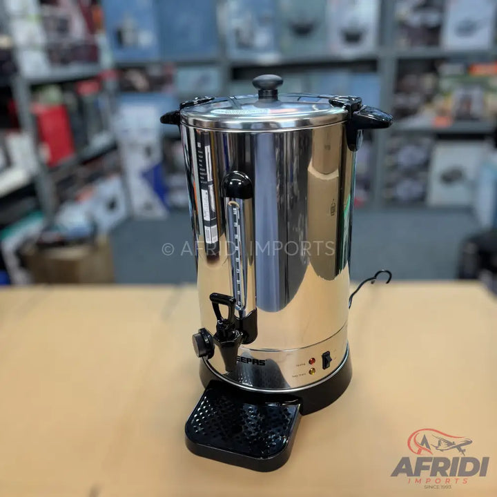 Stainless steel electric hot water urn with a spigot and drip tray.