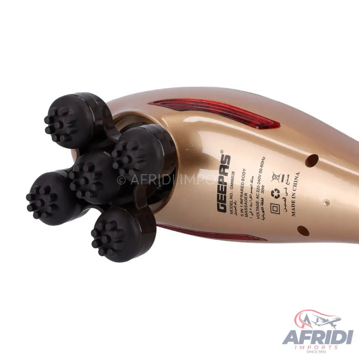 Gold-colored handheld electric body massager with five rotating heads.
