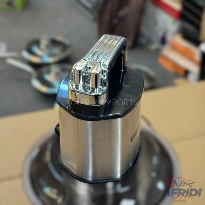 Stainless steel food processor with a black plastic top and chrome accents.