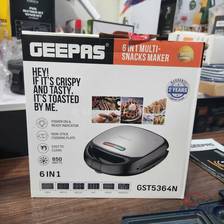 A Geepas 6-in-1 multi-snacks maker with a 2-year warranty and 850 watts of power.