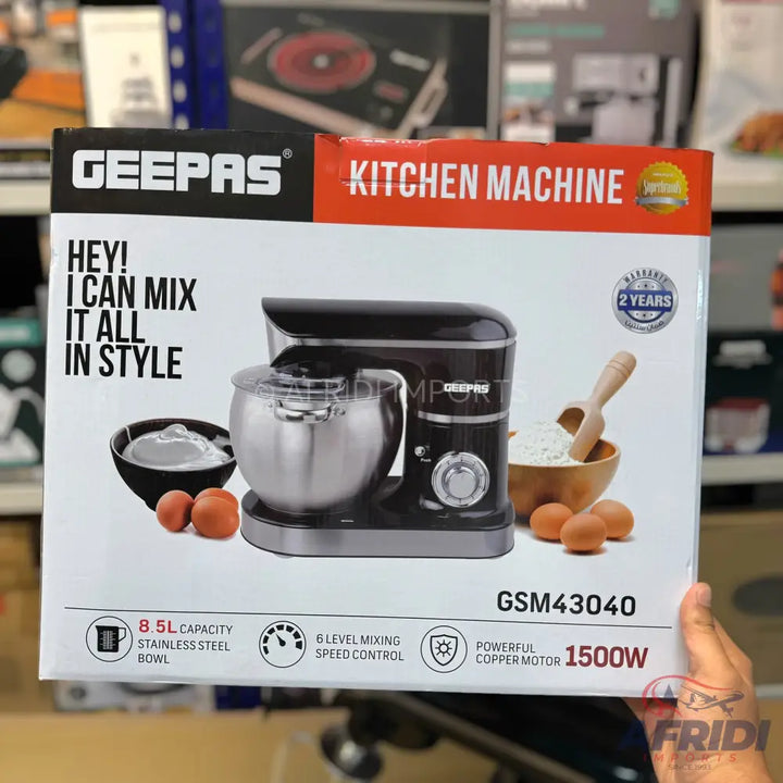 Black kitchen stand mixer with an 8.5L stainless steel bowl, 6-level mixing speed control, and a powerful 1500W copper motor.