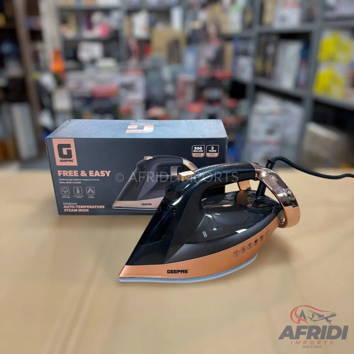 Black and rose gold automatic steam iron with a ceramic soleplate.