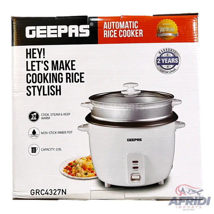 White automatic rice cooker with a steamer basket, non-stick inner pot, and a 2.8L capacity.
