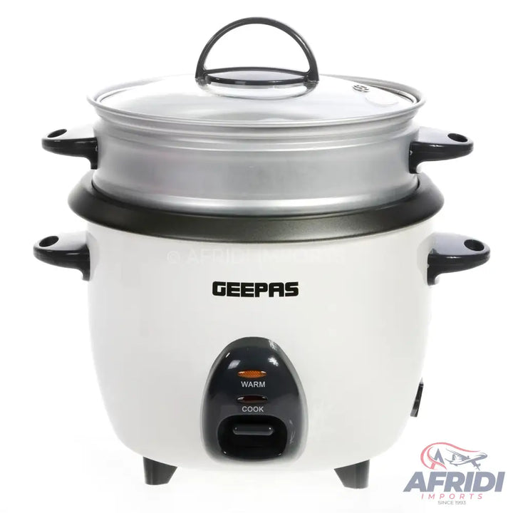 White electric rice cooker with a steamer attachment.