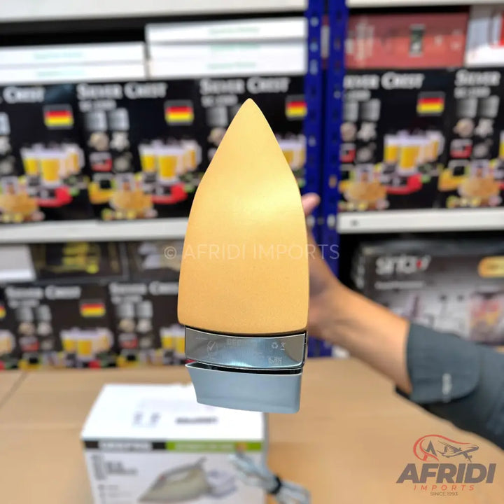A compact, travel-sized steam iron with a glowing, translucent body.