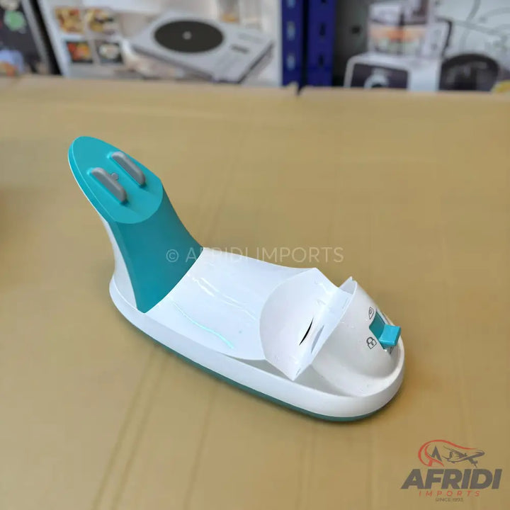 A white and teal manual knife sharpener with two sharpening slots.