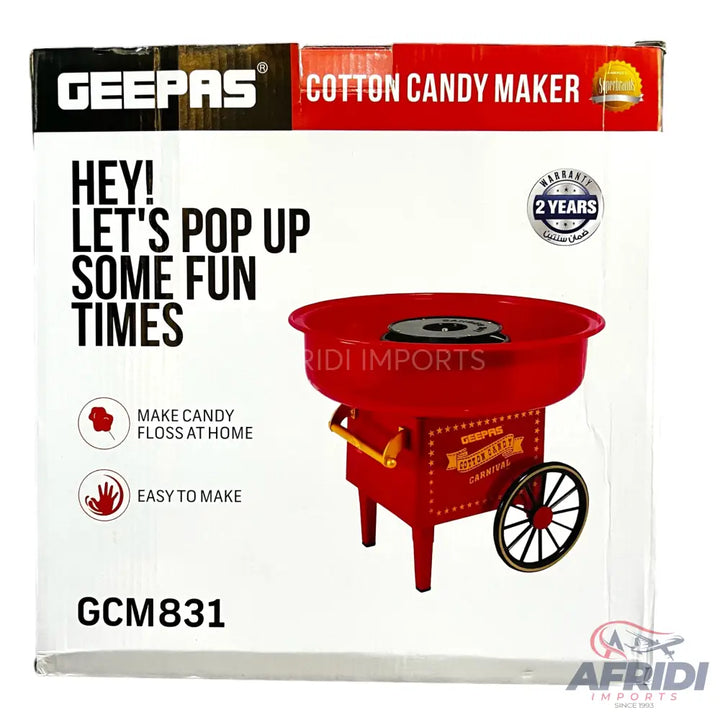 Red cotton candy maker with a vintage carnival design.
