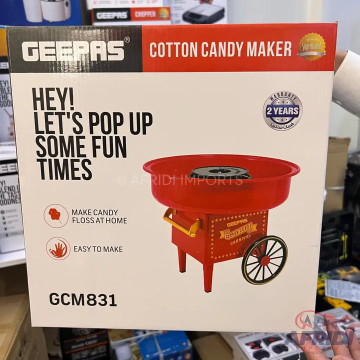A Geepas red cotton candy maker with a carnival-style design and two-year warranty.