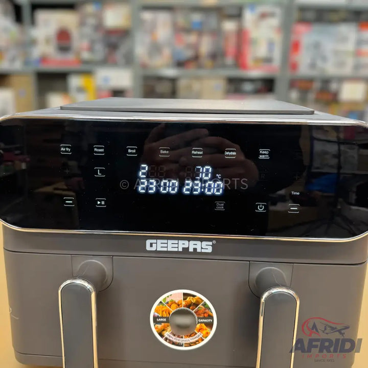 Dual-basket digital air fryer with touchscreen controls.