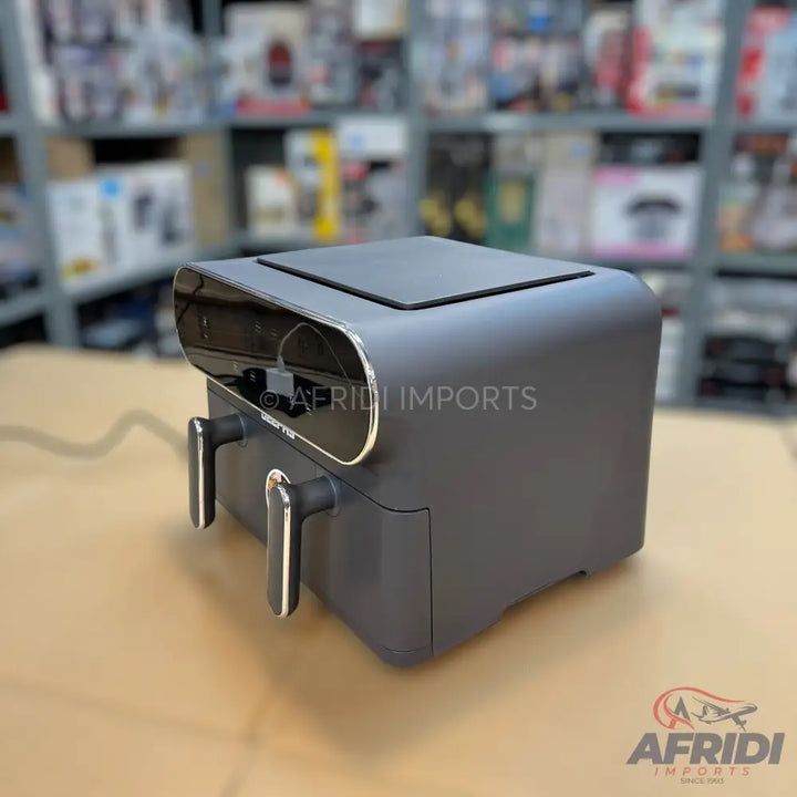 Dark gray, dual-basket air fryer with a sleek, modern design.