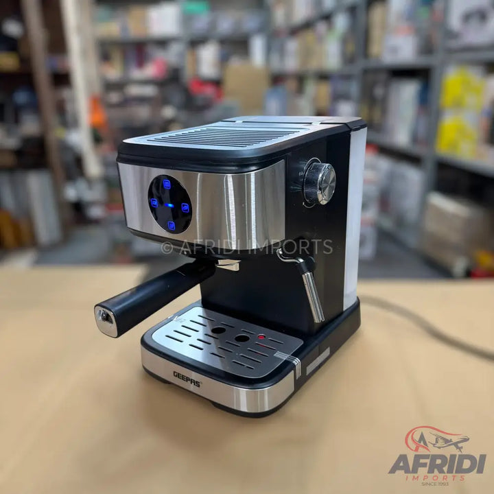 A black and silver espresso machine with a portafilter and steam wand.