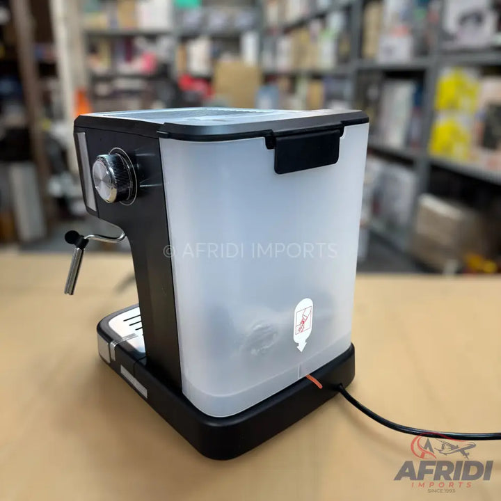 Black and silver espresso machine with a translucent water tank.