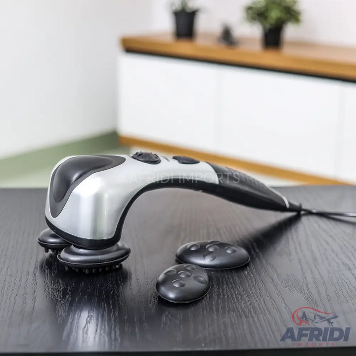 An electric handheld massager with interchangeable heads.