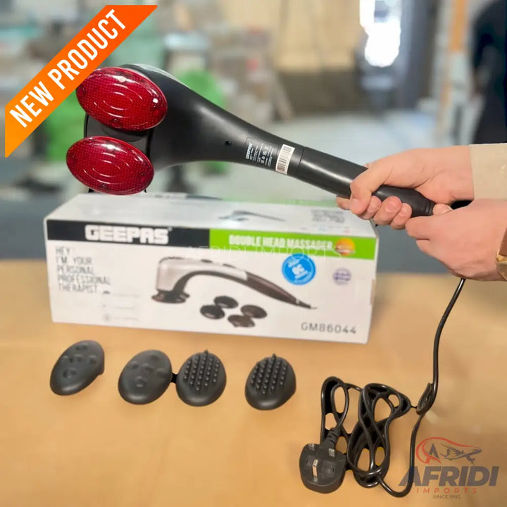 A black handheld double-headed electric massager with interchangeable massage heads.