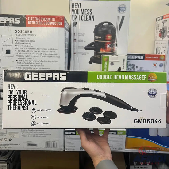 A Geepas double head massager with variable speed, three pair heads, and hot compress function.