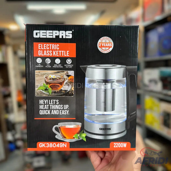 A Geepas electric glass kettle with a 1.8L capacity, filter, boil-dry protection, and automatic cut-off, featuring a 2-year warranty and 2200W power.