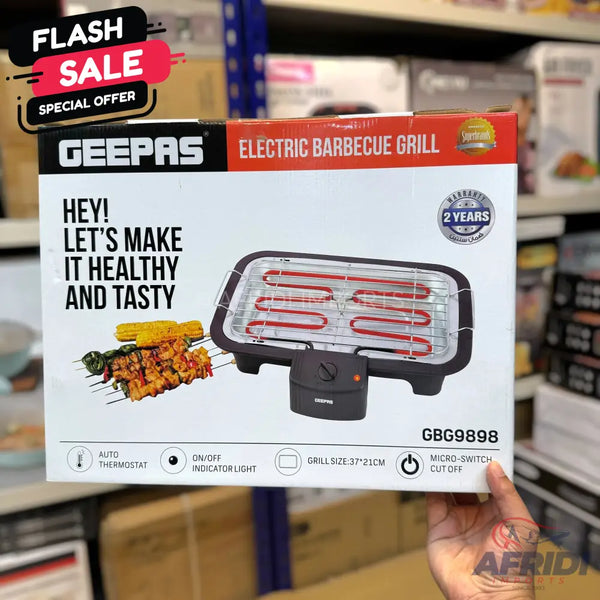 Packaged electric barbecue grill with a 2-year warranty.
