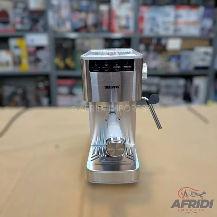 A silver and black espresso machine with multiple control buttons and a steam wand.