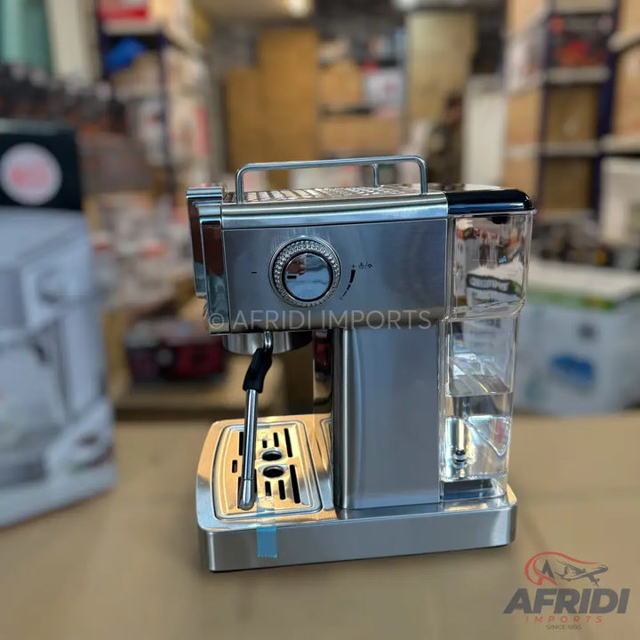 Stainless steel espresso machine with a water tank and steam wand.