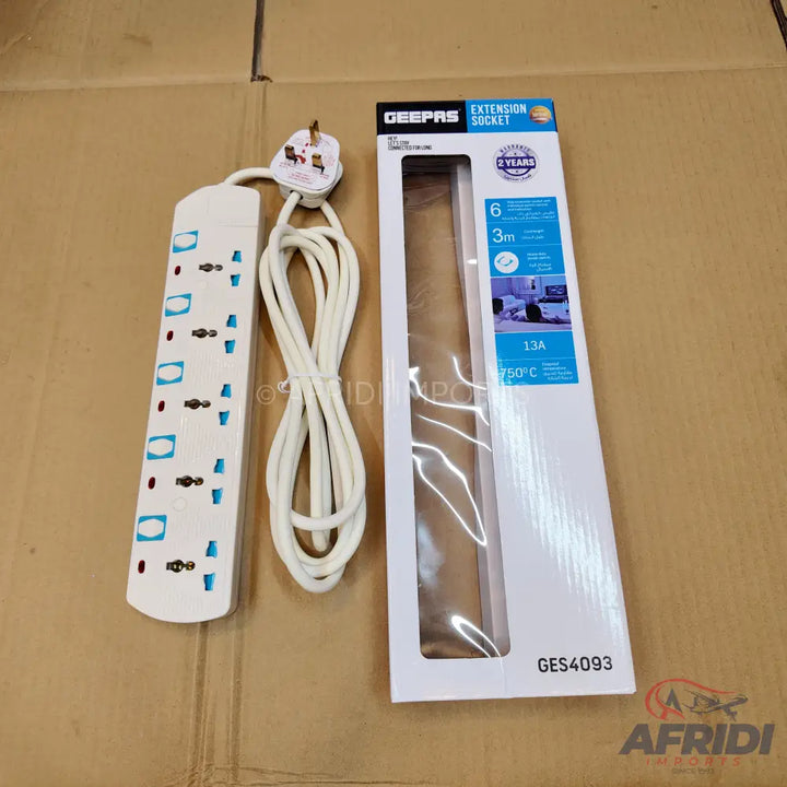 A white electrical extension socket with six multi-standard outlets and a 3-meter cord.