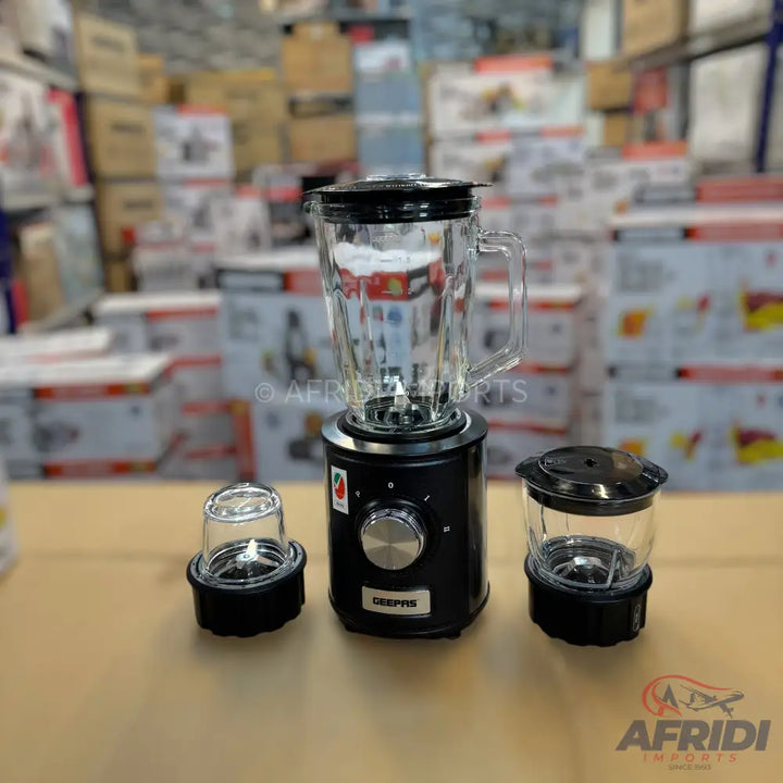 Black blender with a glass jar, two additional grinding attachments, and a ’Flash Sale’ special offer banner.