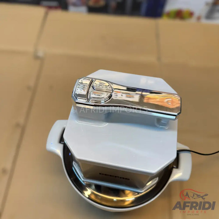 White and silver multi-functional kitchen appliance with a chrome-plated control panel.