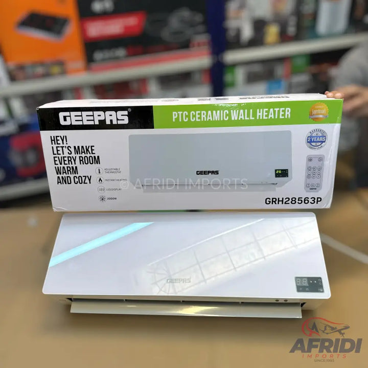 White wall-mounted PTC ceramic heater with remote control.