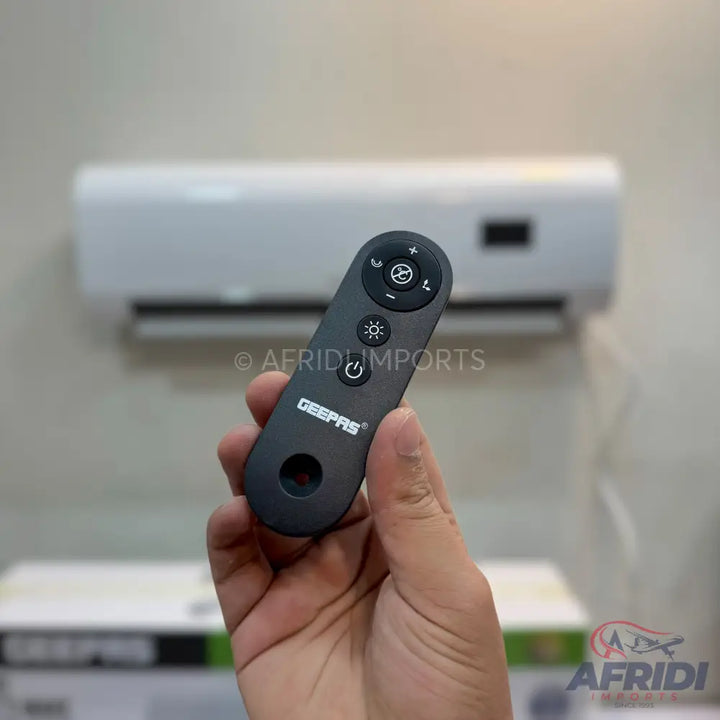 Black remote control for an air conditioner.