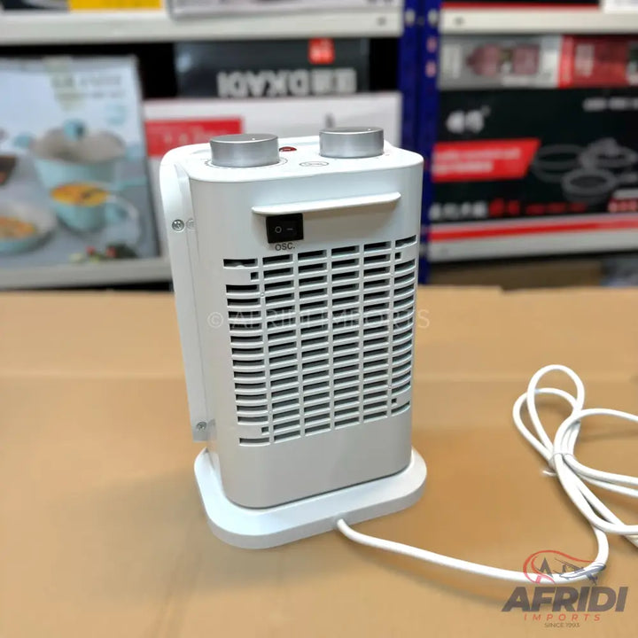 Compact white electric space heater with two control knobs and a power switch.