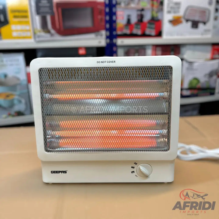 White electric heater with three glowing orange heating elements and a control knob.