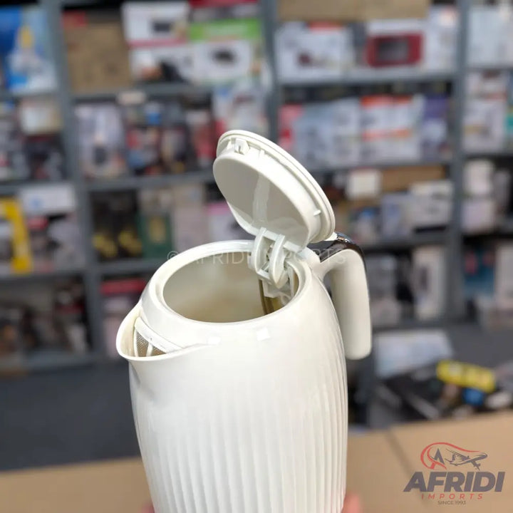 White electric kettle with an open lid.