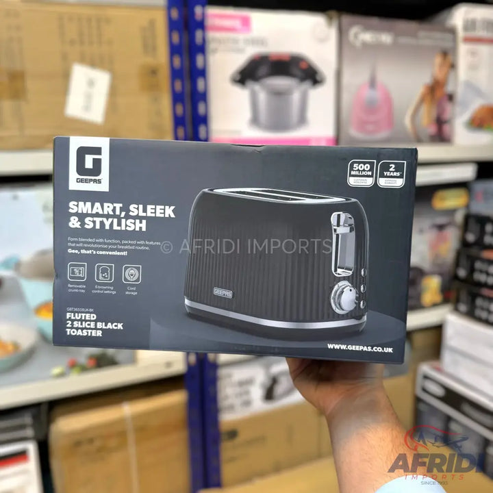 A black two-slice toaster with a fluted design.
