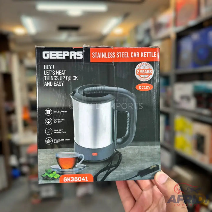 Geepas stainless steel car kettle for quick heating with boil-dry protection and automatic cut-off, powered by DC12V.