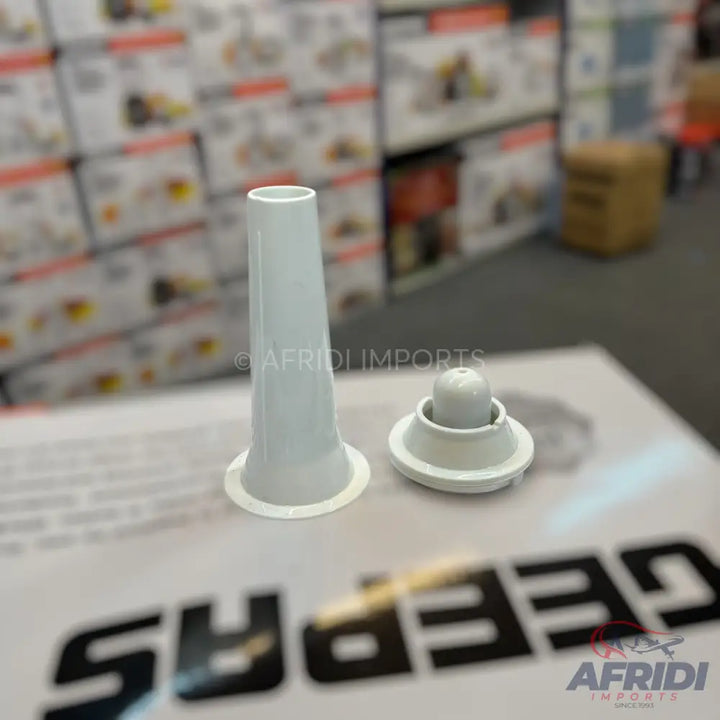 White plastic sausage stuffer and pusher for a meat grinder.