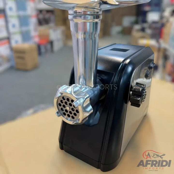 Black and silver electric meat grinder.