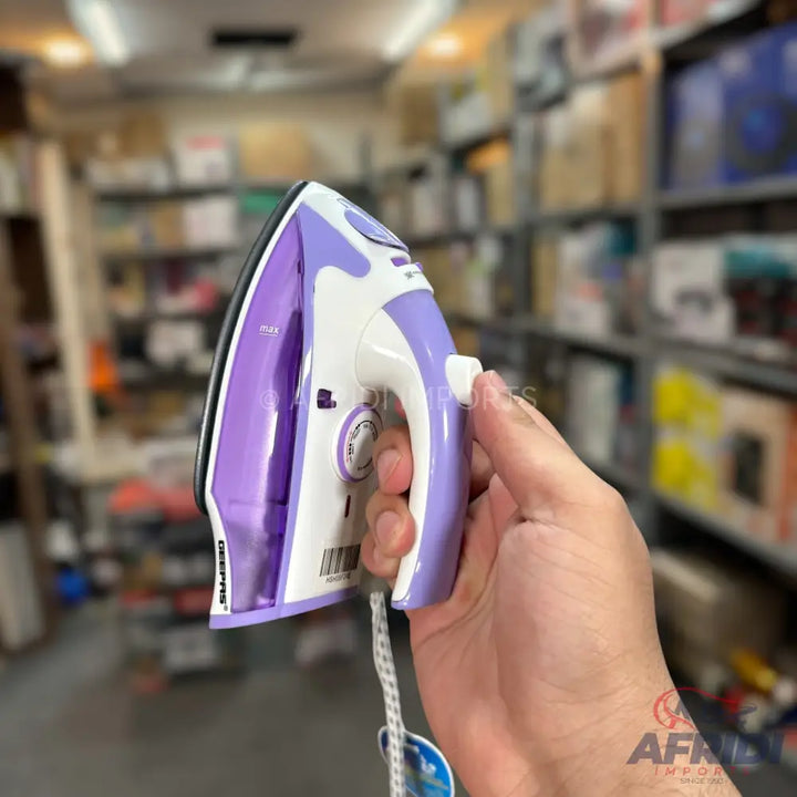 A purple and white steam iron with a temperature control dial and a water tank.