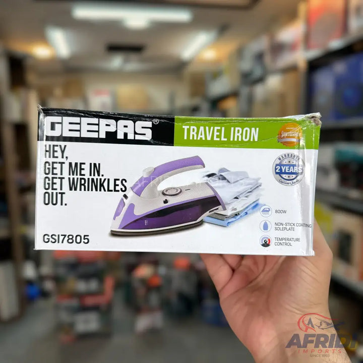 Geepas travel iron with a purple and white design, featuring non-stick soleplate and temperature control.